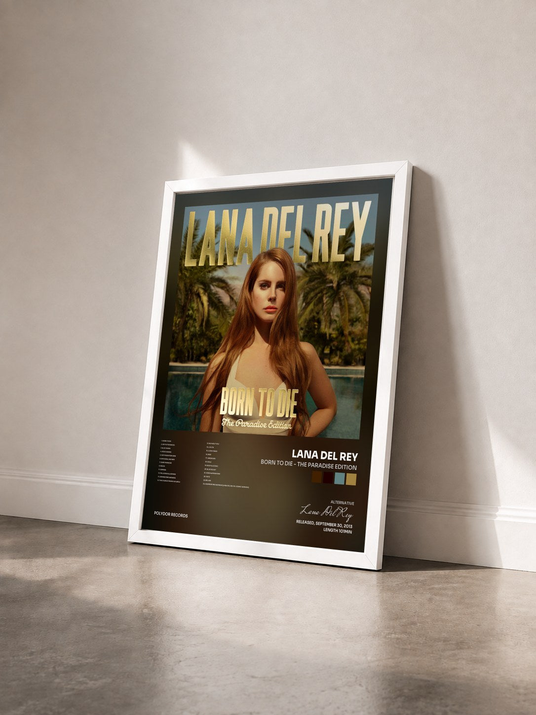 #blanc Tableau de l'album Born To Die - The Paradise Edition de Lana Del Rey vu de trois quarts, cadre blanc