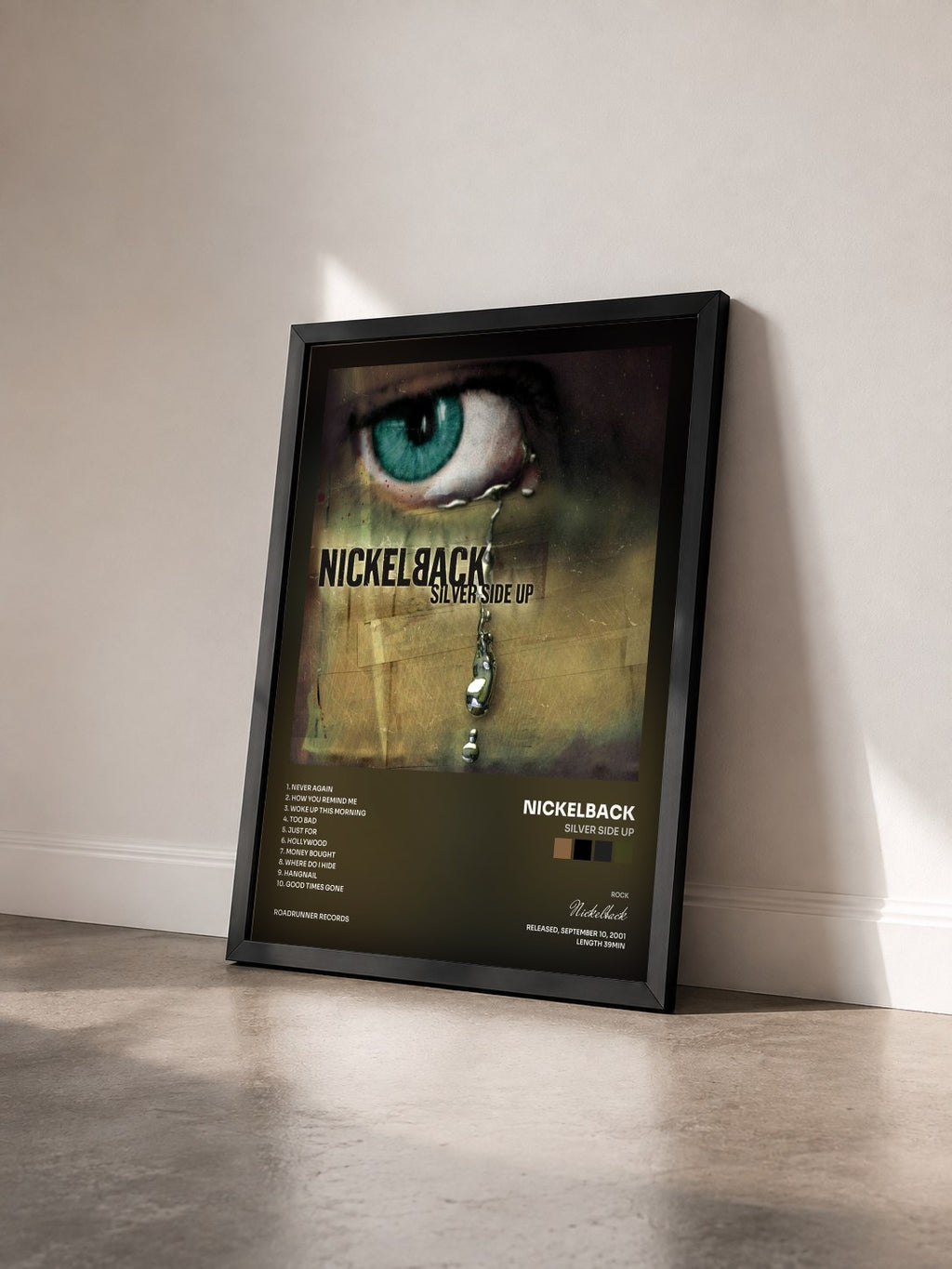 #noir Tableau de l'album Silver Side Up de Nickelback vu de trois quarts, cadre noir