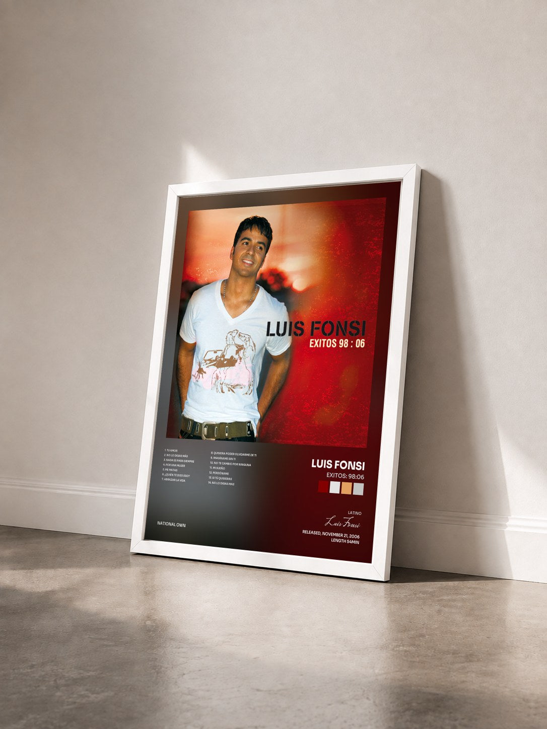 #blanc Exitos: 98:06 de Luis Fonsi en lámina enmarcada vista de tres cuartos, marco blanco