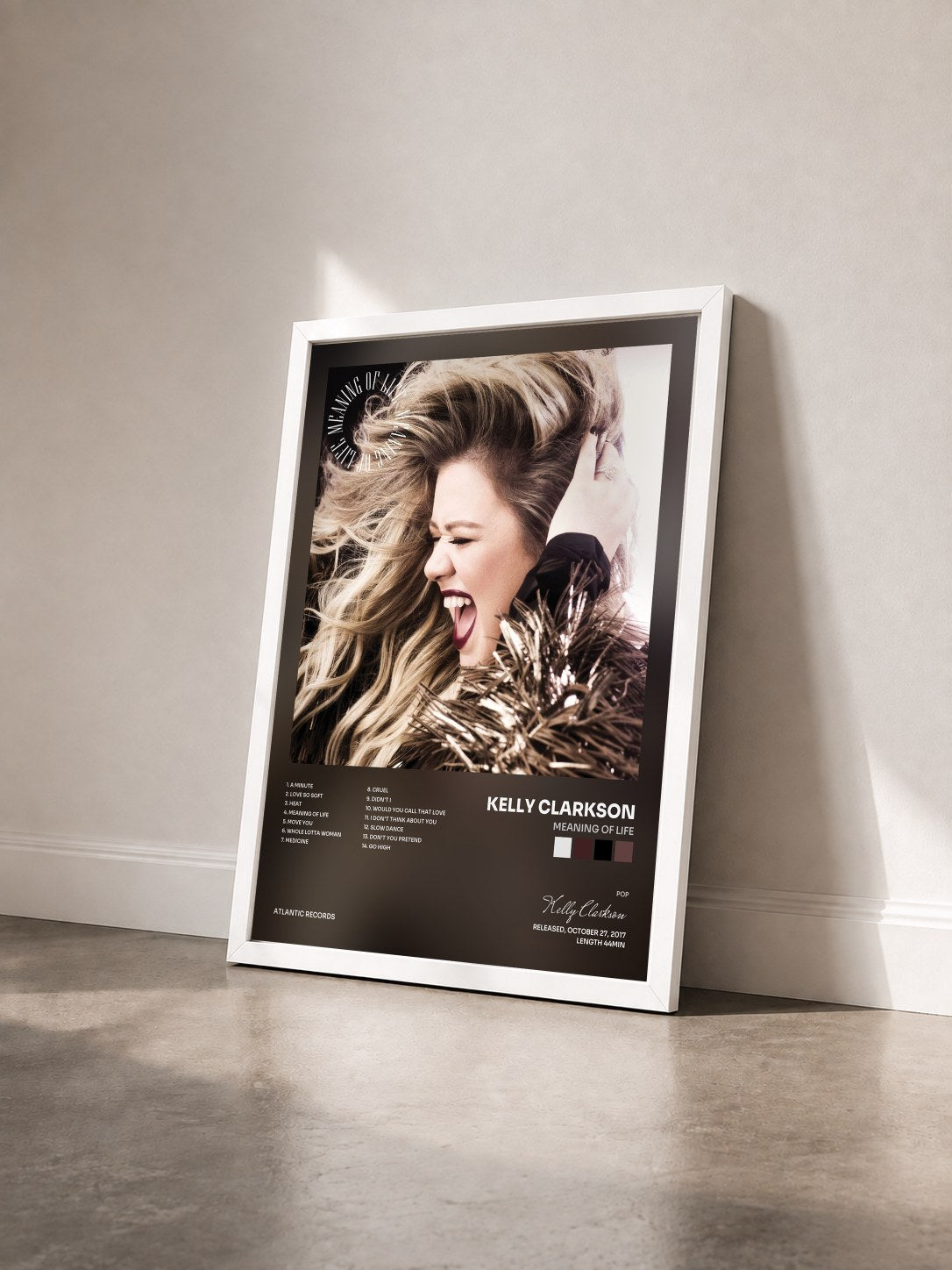 #blanc Tableau de l'album Meaning of Life de Kelly Clarkson vu de trois quarts, cadre blanc