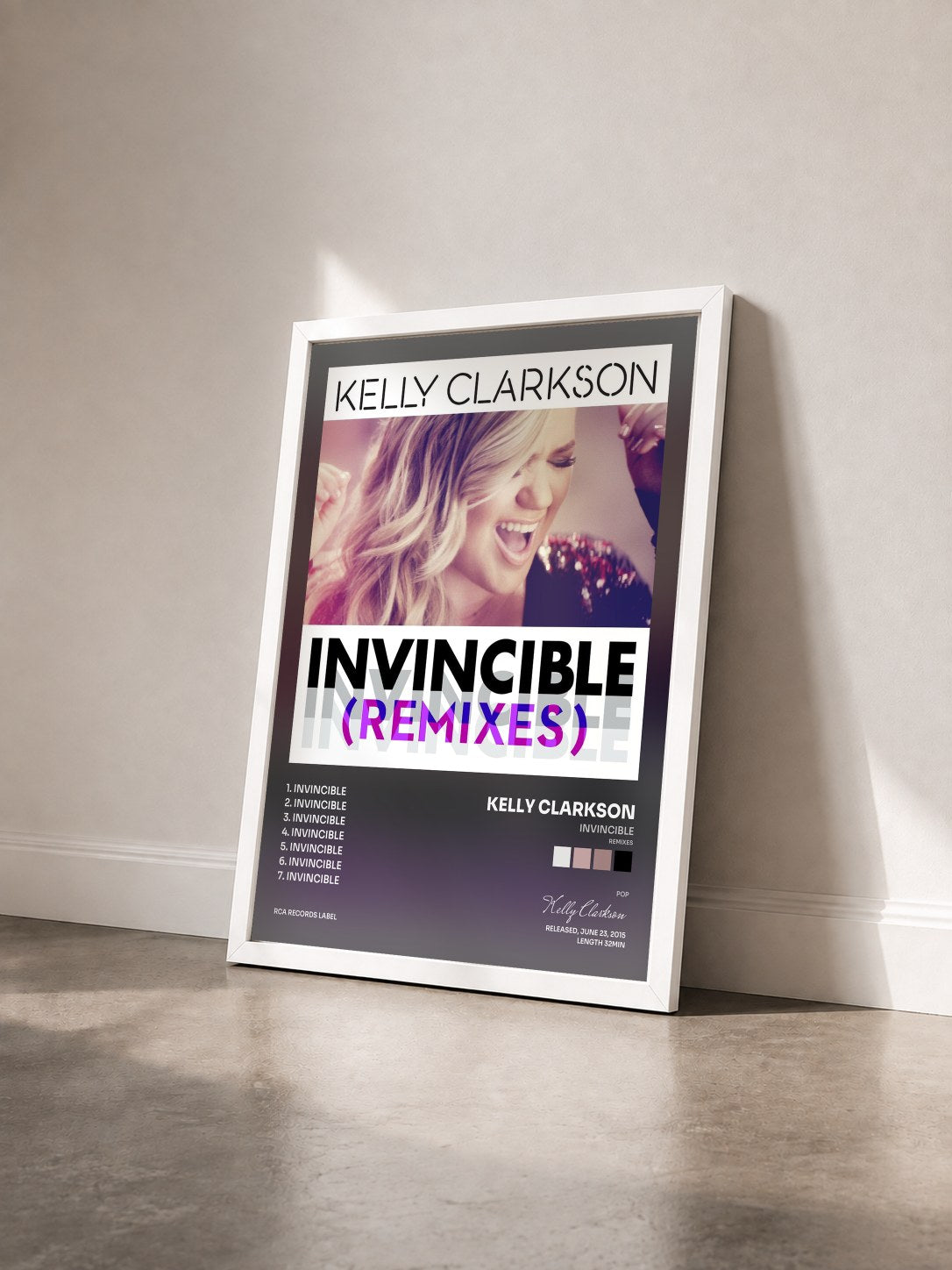 #blanc Tableau de l'album Invincible (Remixes) de Kelly Clarkson vu de trois quarts, cadre blanc