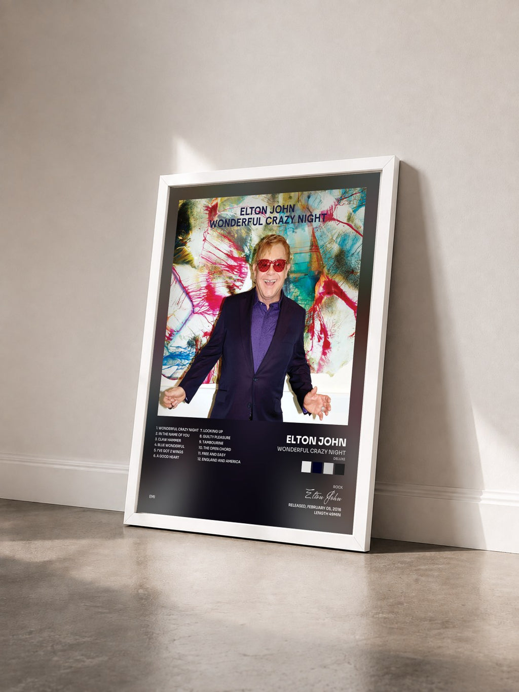 #blanc Tableau de l'album Wonderful Crazy Night (Deluxe) de Elton John vu de trois quarts, cadre blanc