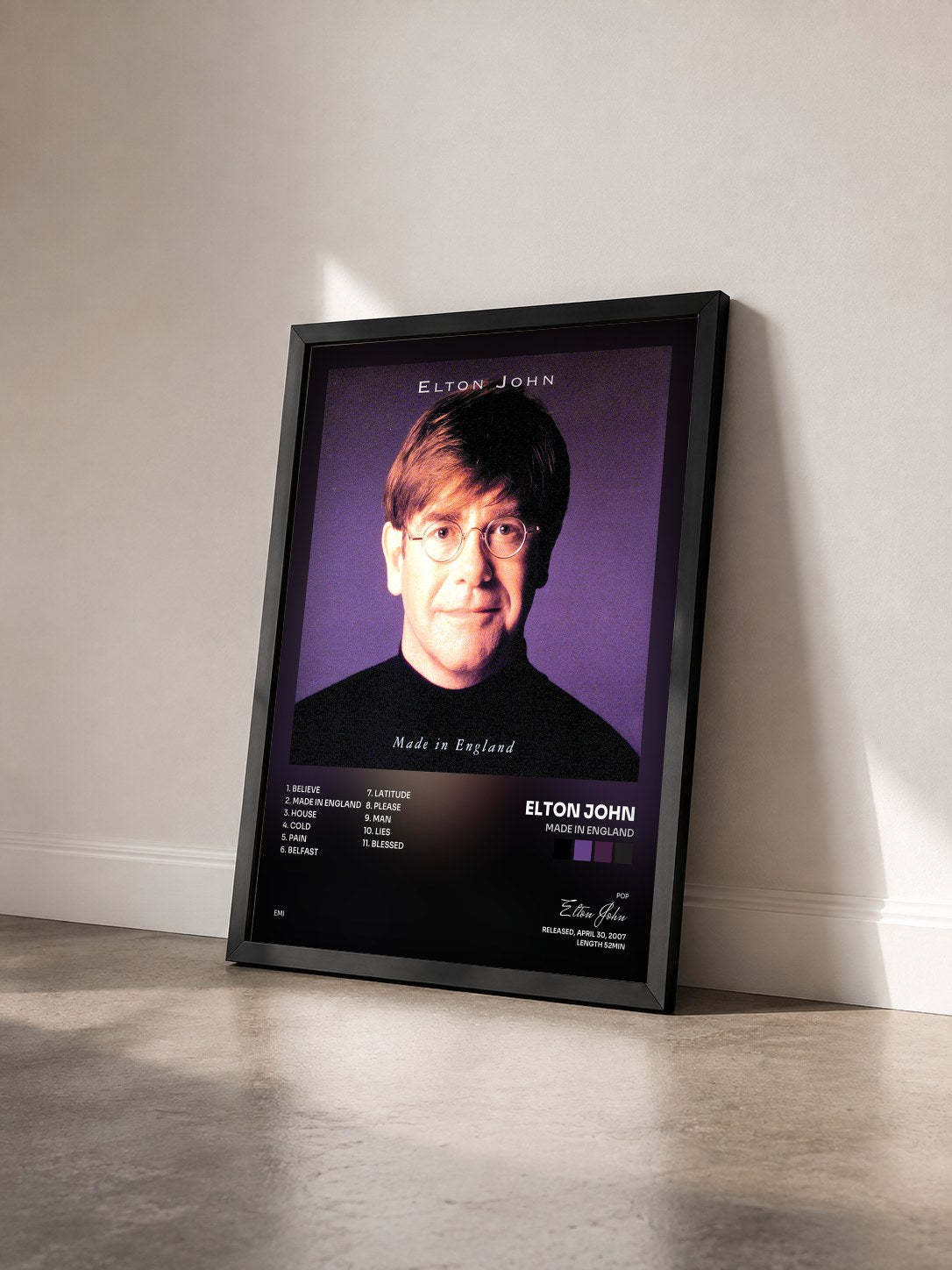 #noir Tableau de l'album Made In England de Elton John vu de trois quarts, cadre noir