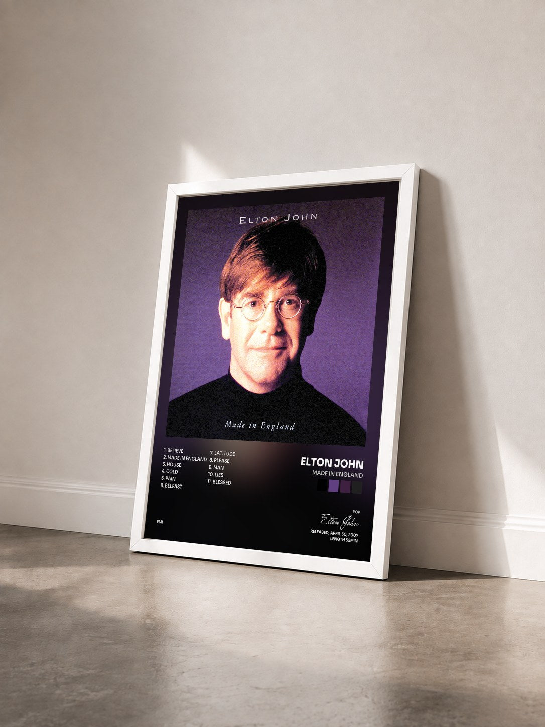 #blanc Tableau de l'album Made In England de Elton John vu de trois quarts, cadre blanc