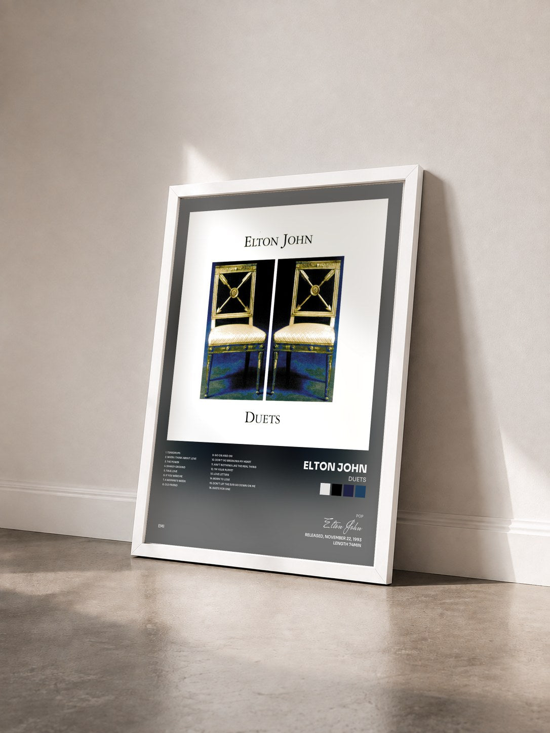#blanc Tableau de l'album Duets de Elton John vu de trois quarts, cadre blanc