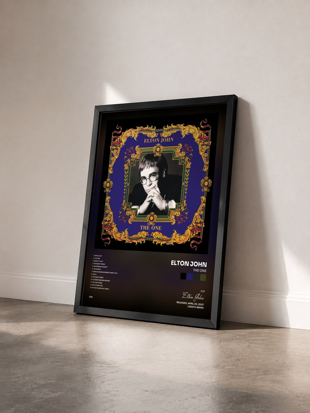 #noir Tableau de l'album The One de Elton John vu de trois quarts, cadre noir