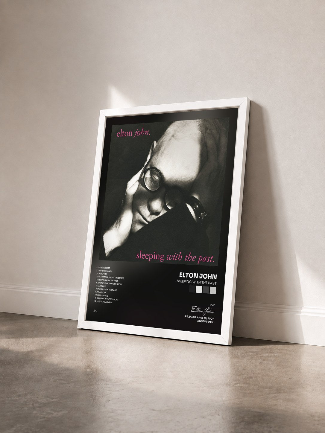 #blanc Tableau de l'album Sleeping With The Past de Elton John vu de trois quarts, cadre blanc