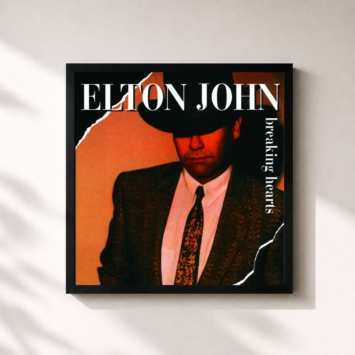 #noir Tableau carré de l'album Breaking Hearts de Elton John, cadre noir 32x32 cm