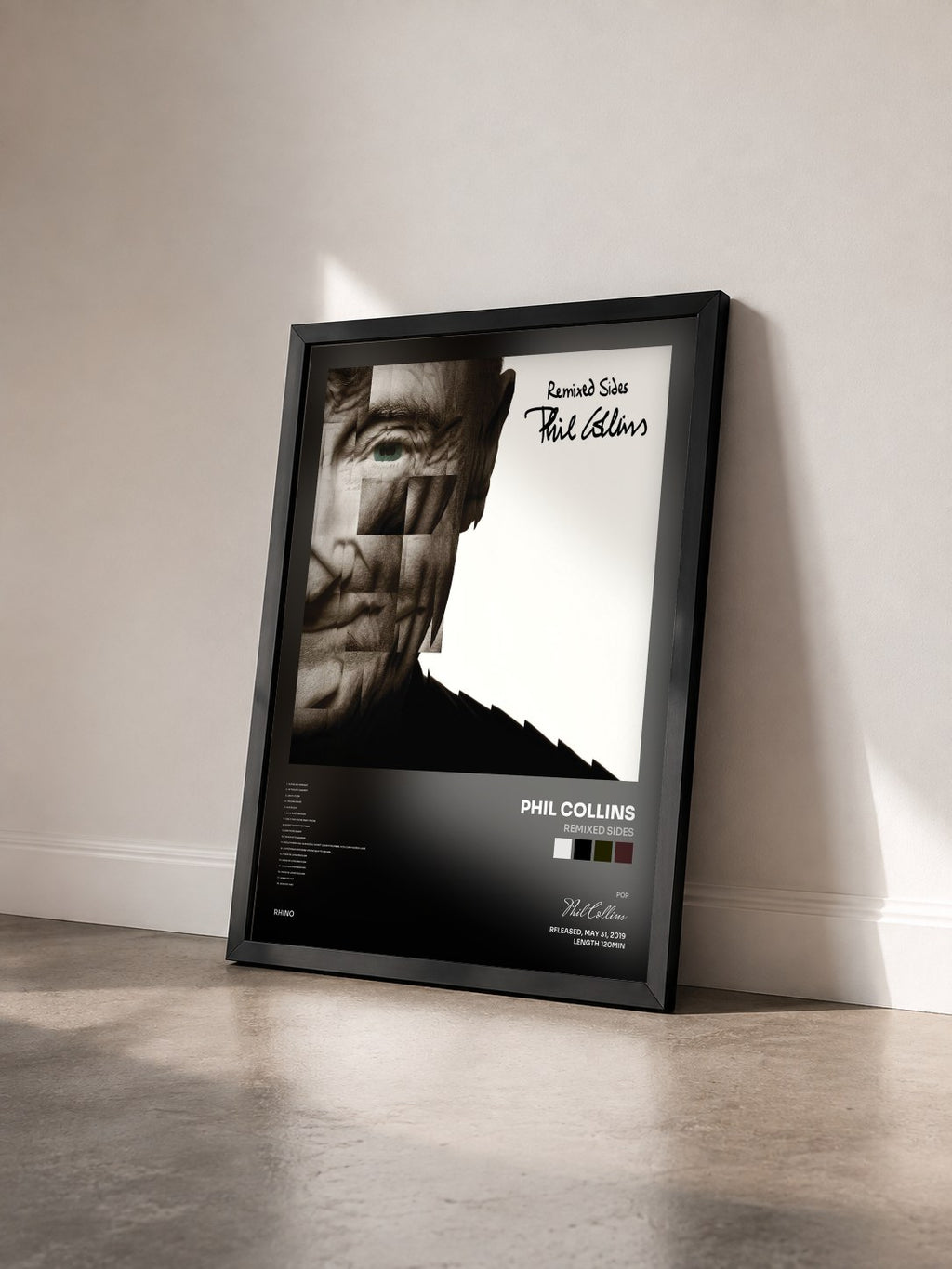 #noir Tableau de l'album Remixed Sides de Phil Collins vu de trois quarts, cadre noir