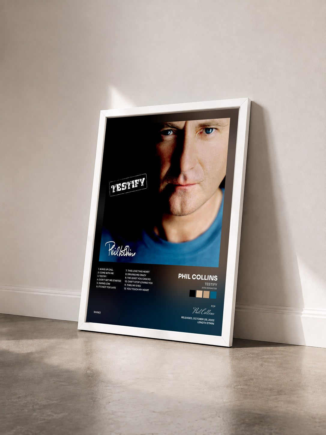 #blanc Tableau de l'album Testify (2016 Remaster) de Phil Collins vu de trois quarts, cadre blanc