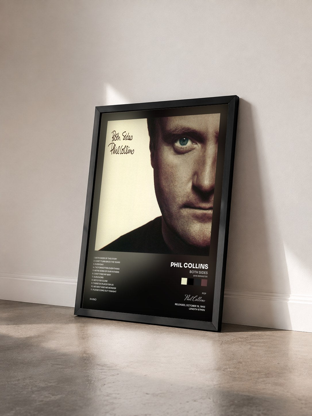 #noir Tableau de l'album Both Sides (2015 Remaster) de Phil Collins vu de trois quarts, cadre noir