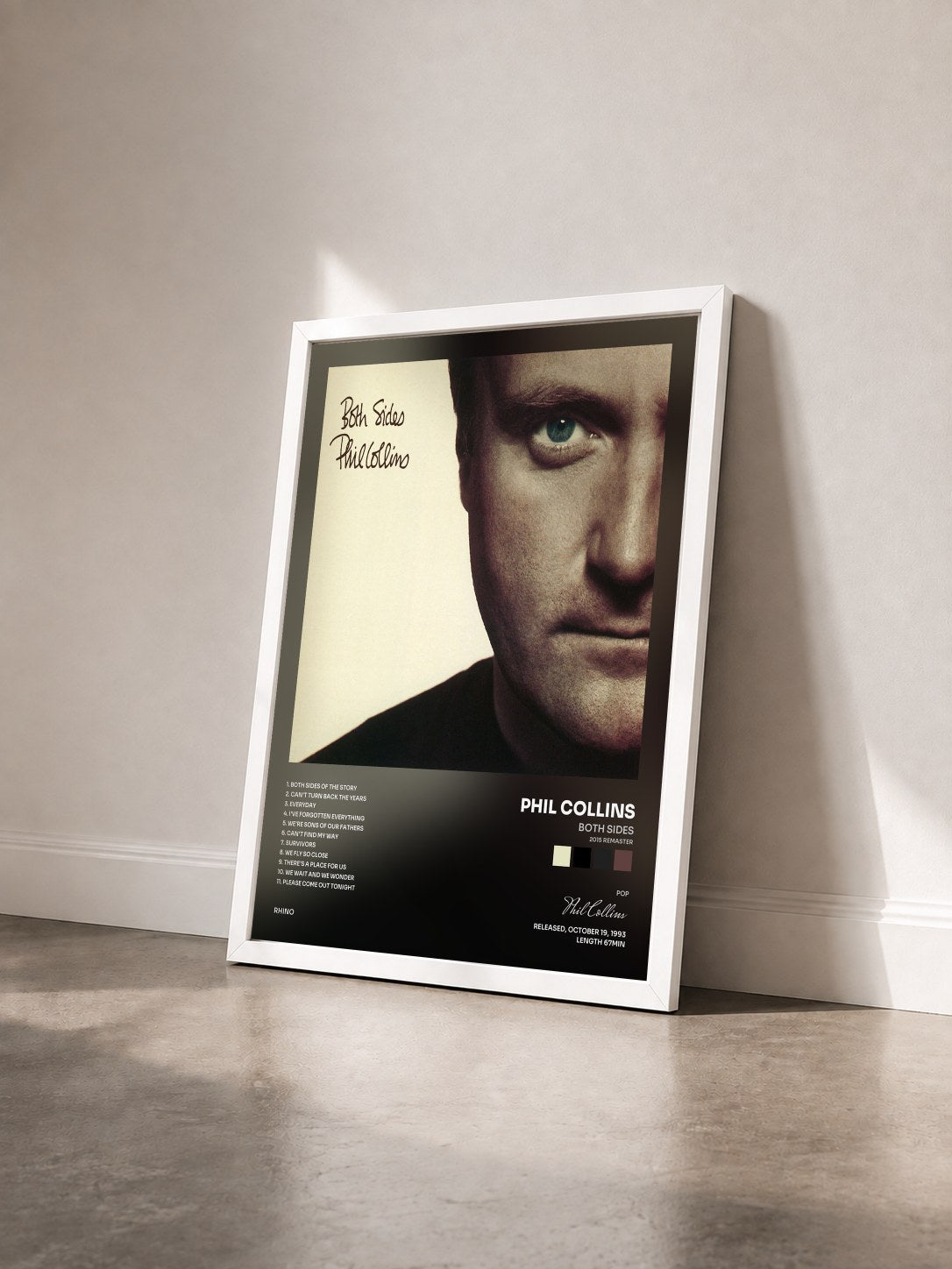 #blanc Tableau de l'album Both Sides (2015 Remaster) de Phil Collins vu de trois quarts, cadre blanc