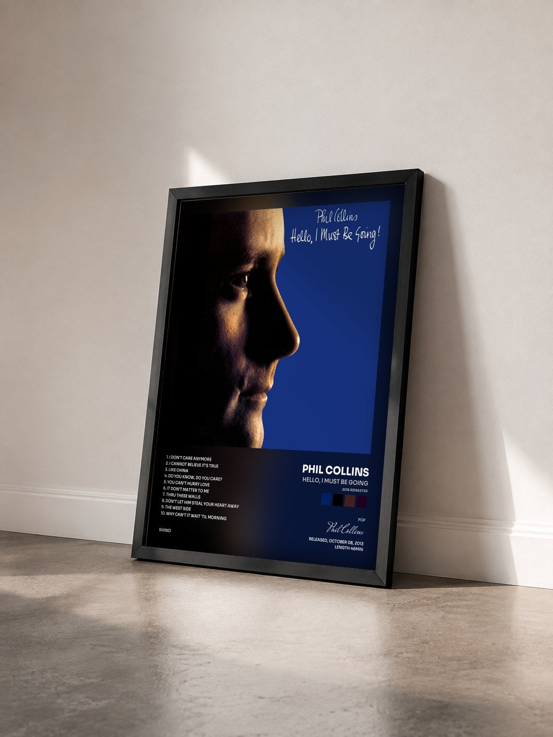 #noir Tableau de l'album Hello, I Must Be Going (2016 Remaster) de Phil Collins vu de trois quarts, cadre noir