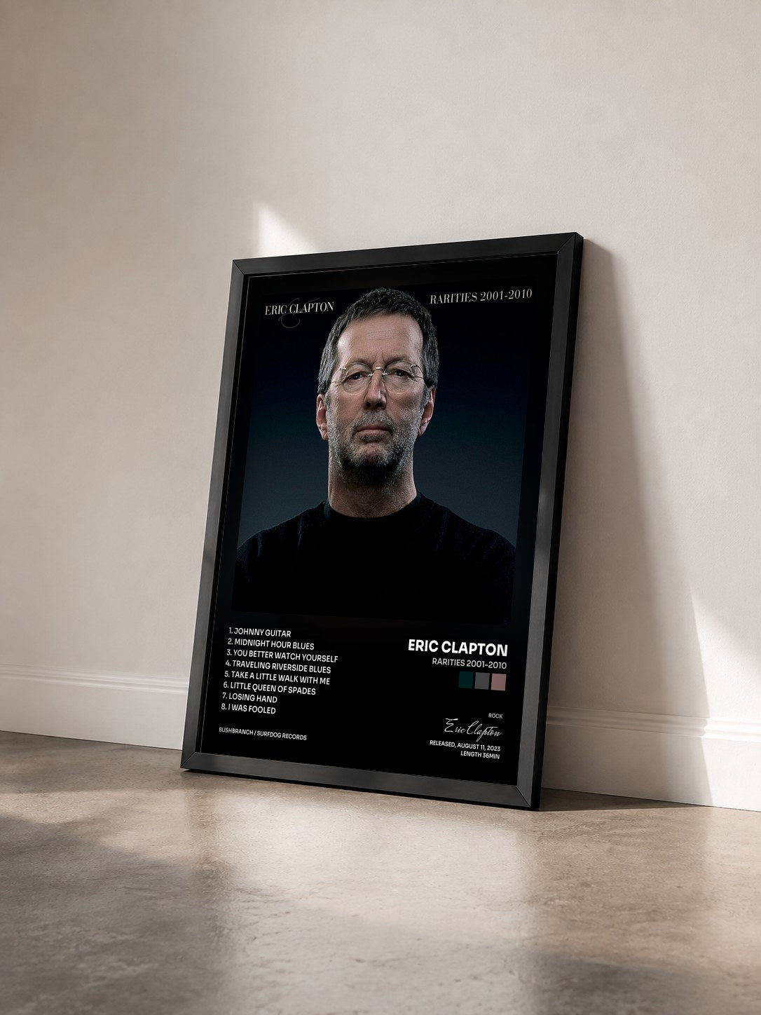 #noir Tableau de l'album Rarities 2001-2010 de Eric Clapton vu de trois quarts, cadre noir