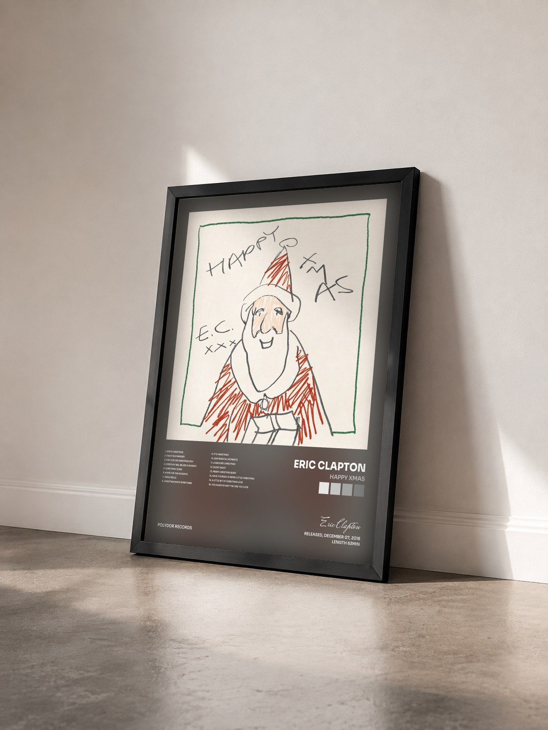 #noir Tableau de l'album Happy Xmas de Eric Clapton vu de trois quarts, cadre noir