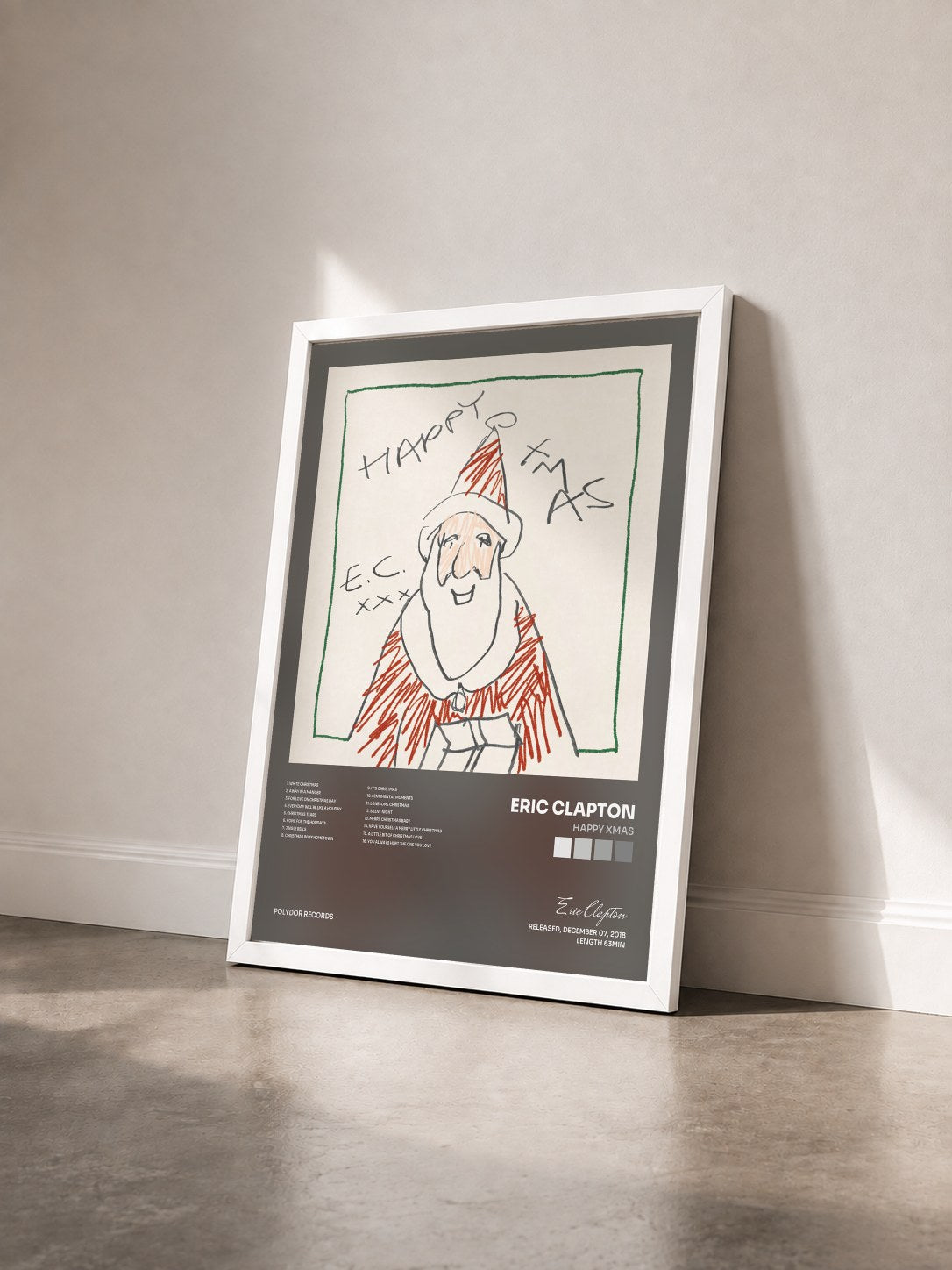 #blanc Tableau de l'album Happy Xmas de Eric Clapton vu de trois quarts, cadre blanc