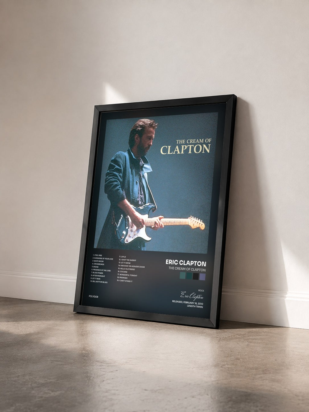 #noir Tableau de l'album The Cream Of Clapton de Eric Clapton vu de trois quarts, cadre noir