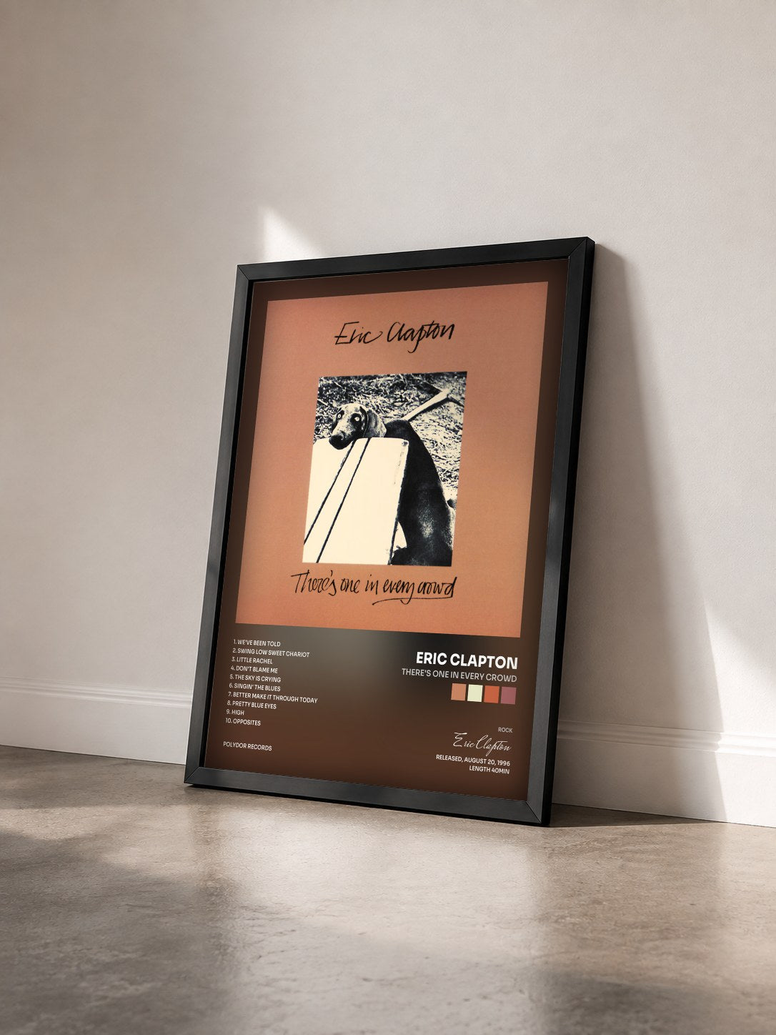 #noir Tableau de l'album There's One In Every Crowd de Eric Clapton vu de trois quarts, cadre noir