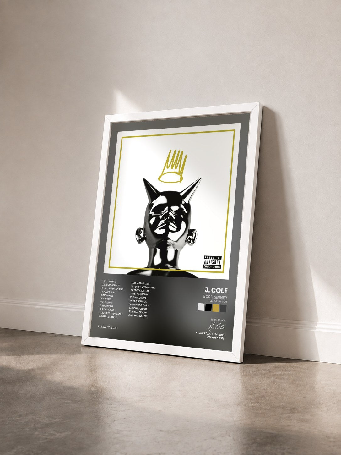 #blanc Tableau de l'album Born Sinner (Deluxe Version) de J. Cole vu de trois quarts, cadre blanc