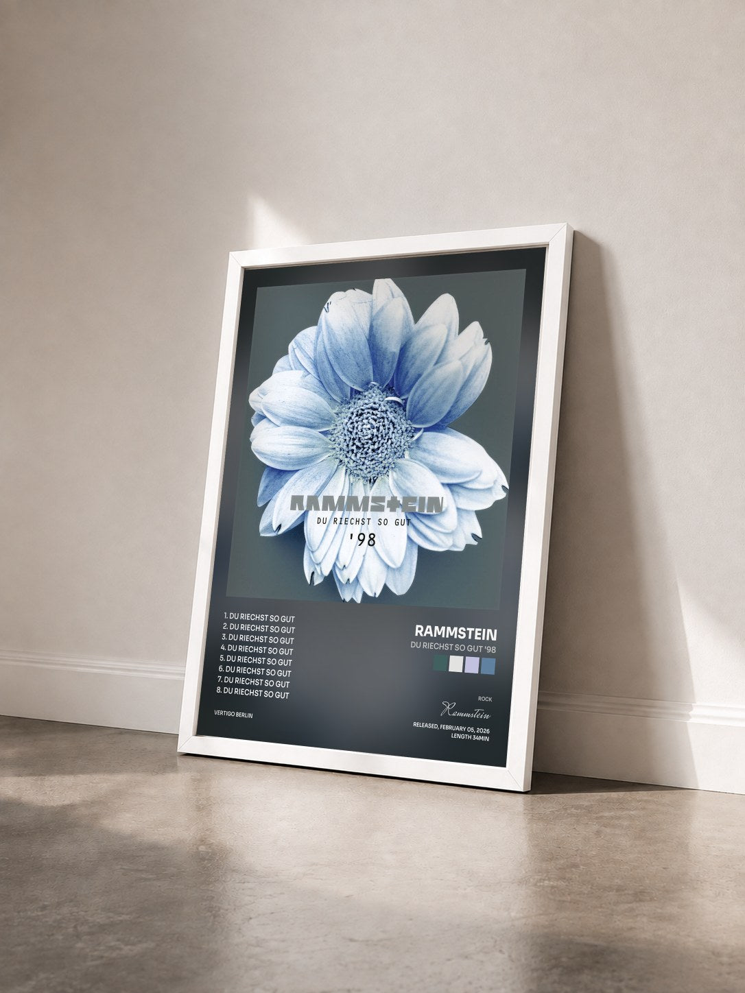 #blanc Du riechst so gut '98 by Rammstein as a framed art print seen at an angle, white frame