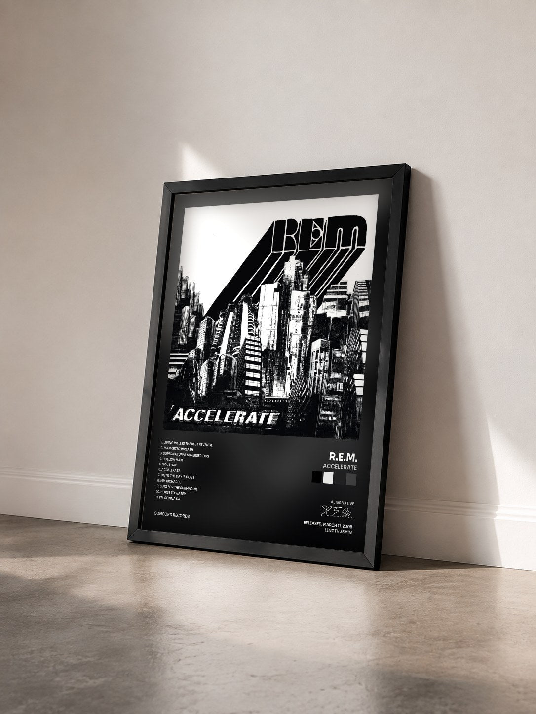 #noir Tableau de l'album Accelerate de R.E.M. vu de trois quarts, cadre noir