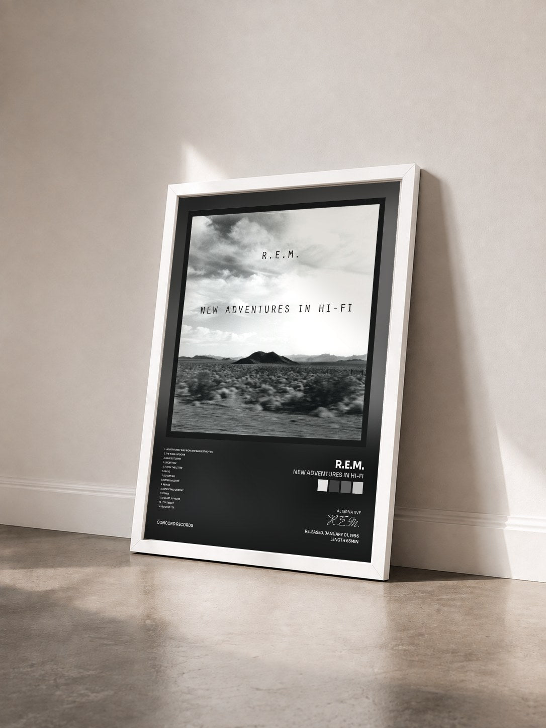 #blanc Tableau de l'album New Adventures In Hi-Fi de R.E.M. vu de trois quarts, cadre blanc