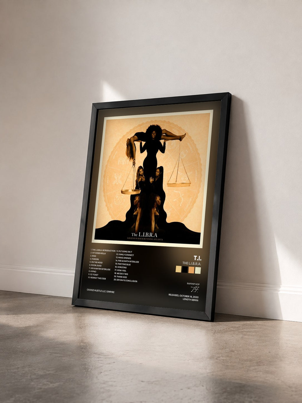 #noir The L.I.B.R.A. by T.I. as a framed art print seen at an angle, black frame