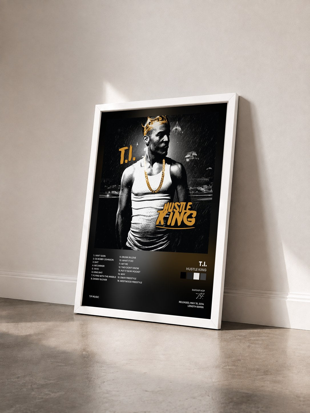 #blanc Hustle King by T.I. as a framed art print seen at an angle, white frame
