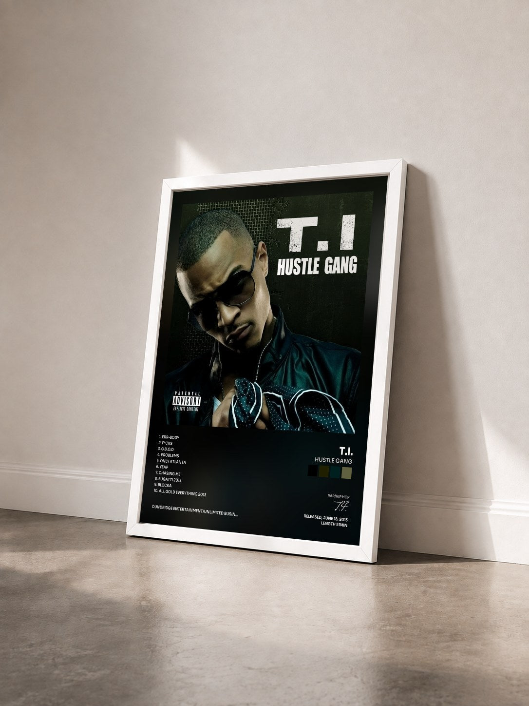 #blanc Hustle Gang by T.I. as a framed art print seen at an angle, white frame