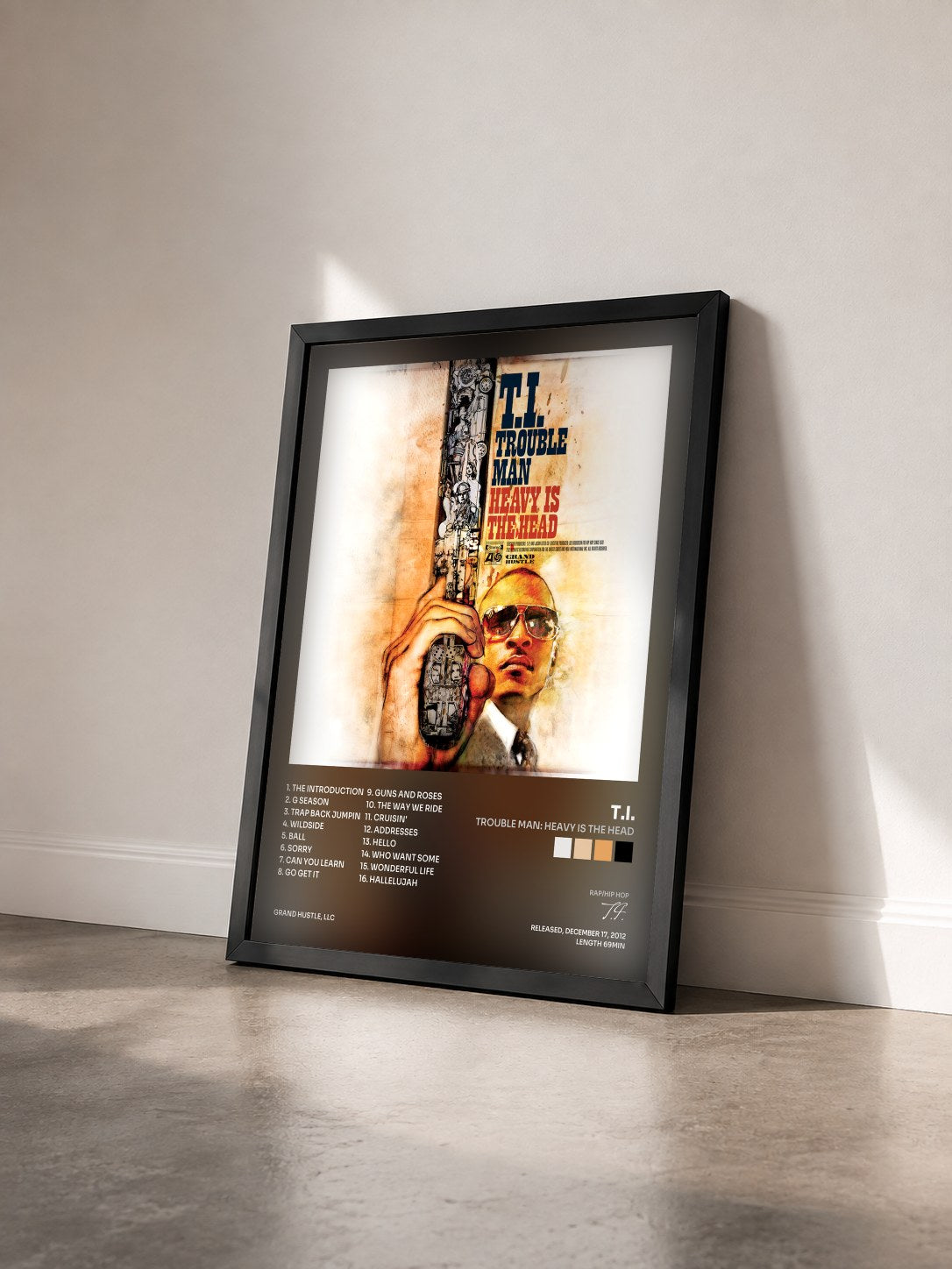 #noir Trouble Man: Heavy is the Head by T.I. as a framed art print seen at an angle, black frame
