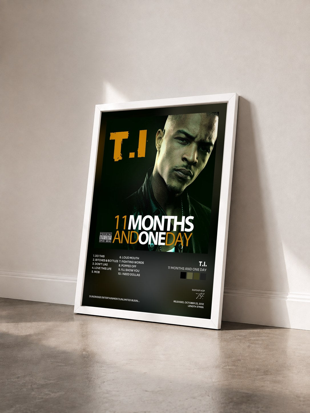 #blanc 11 Months and One Day by T.I. as a framed art print seen at an angle, white frame