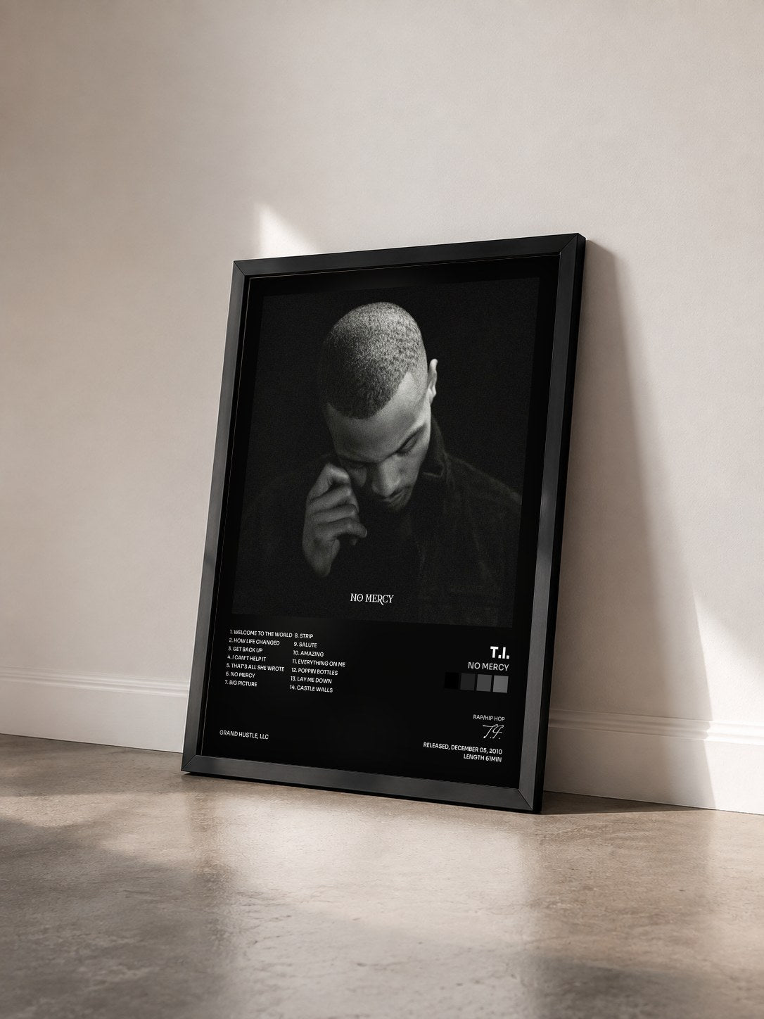 #noir No Mercy by T.I. as a framed art print seen at an angle, black frame