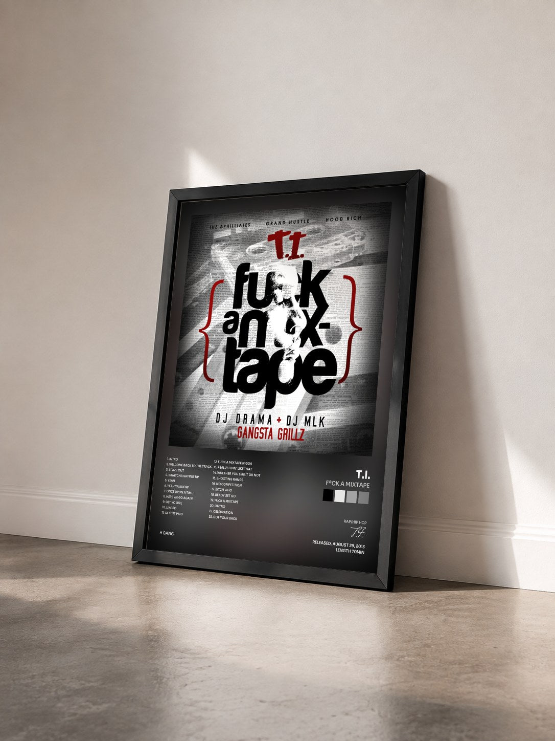 #noir F*ck A Mixtape by T.I. as a framed art print seen at an angle, black frame