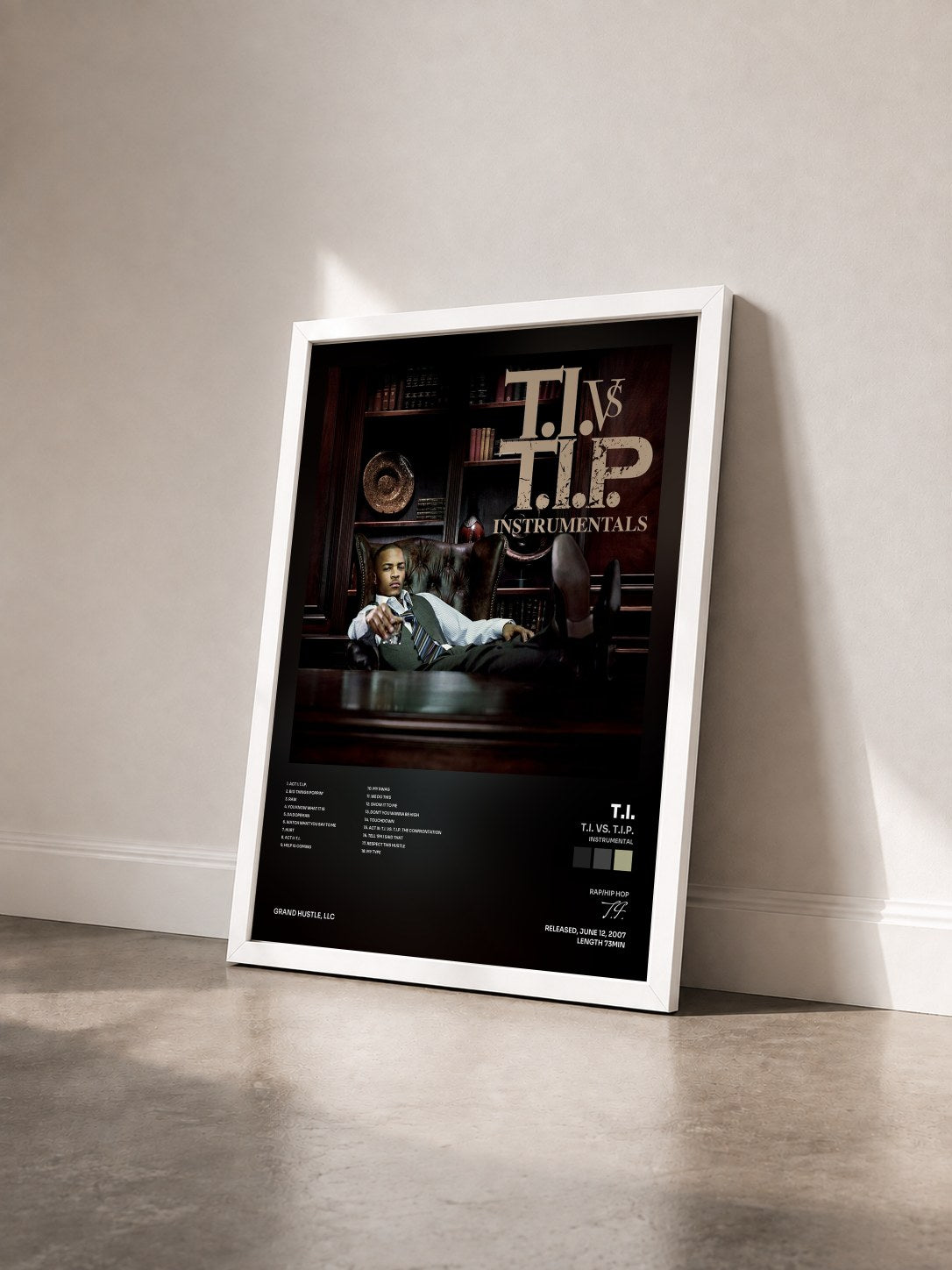 #blanc T.I. vs. T.I.P. (Instrumental) by T.I. as a framed art print seen at an angle, white frame
