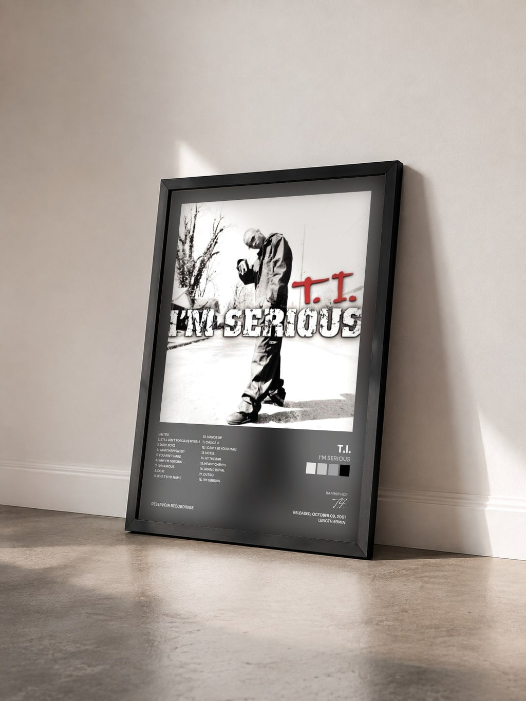 #noir Tableau de l'album I'm Serious de T.I. vu de trois quarts, cadre noir