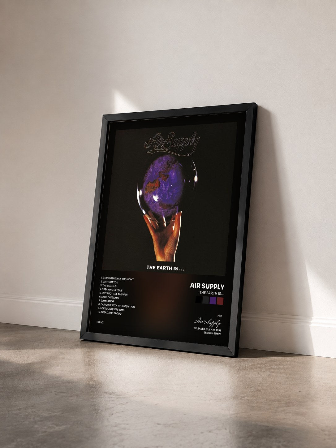 #noir The Earth Is... by Air Supply as a framed art print seen at an angle, black frame