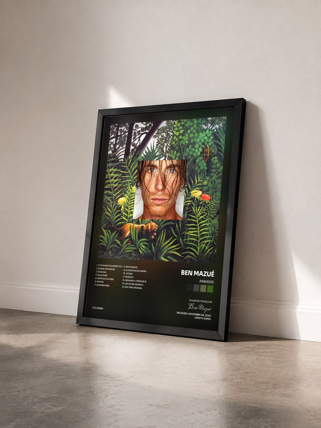 #noir Paradis by Ben Mazué as a framed art print seen at an angle, black frame