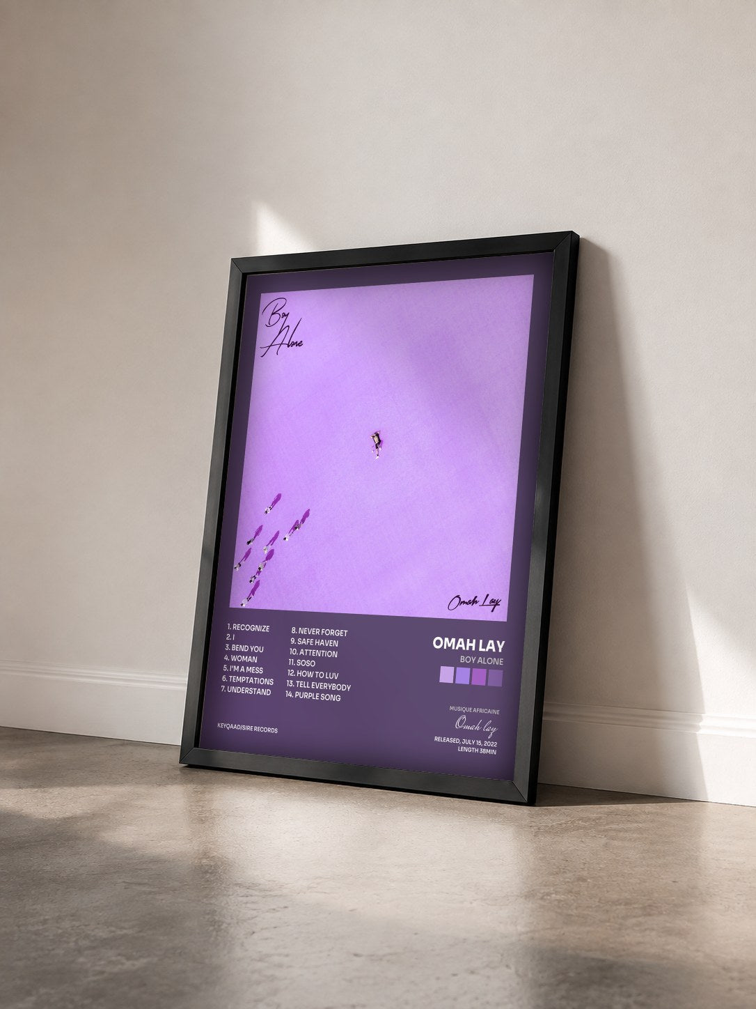 #noir Tableau de l'album Boy Alone de Omah lay vu de trois quarts, cadre noir