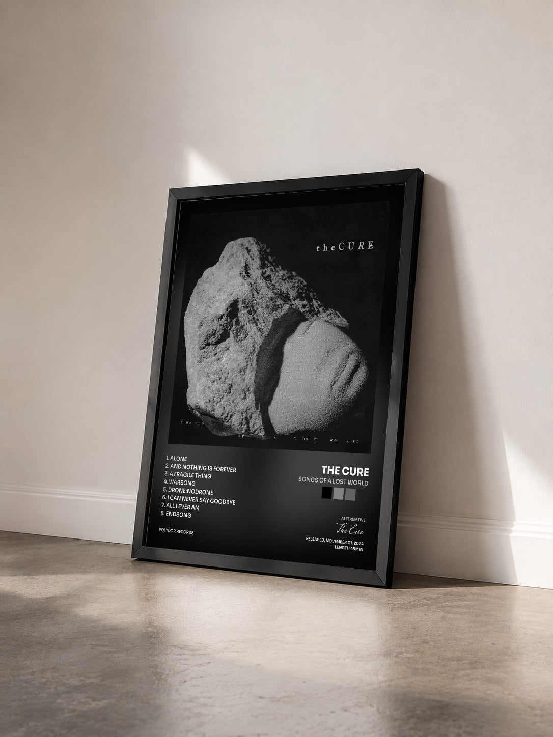 #noir Tableau de l'album Songs Of A Lost World de The Cure vu de trois quarts, cadre noir