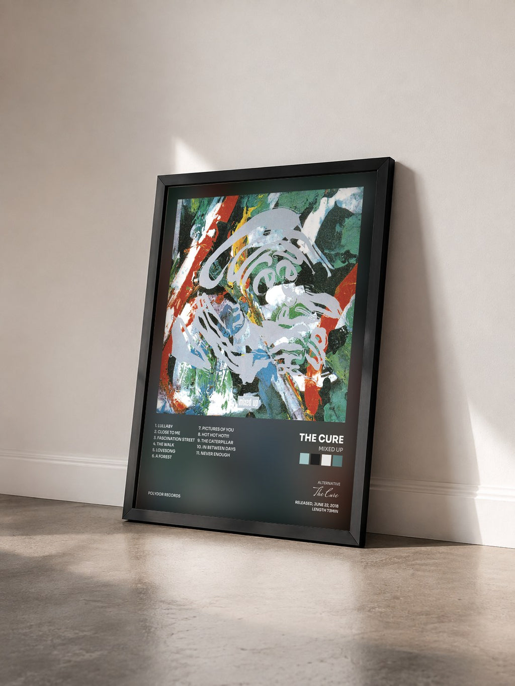 #noir Tableau de l'album Mixed Up de The Cure vu de trois quarts, cadre noir
