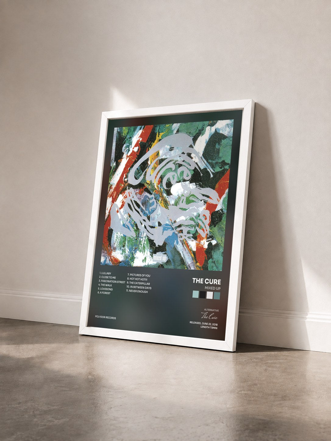 #blanc Tableau de l'album Mixed Up de The Cure vu de trois quarts, cadre blanc