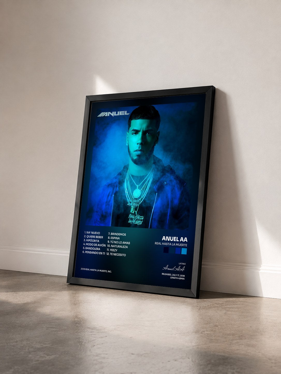 #noir Tableau de l'album Real Hasta la Muerte de Anuel AA vu de trois quarts, cadre noir
