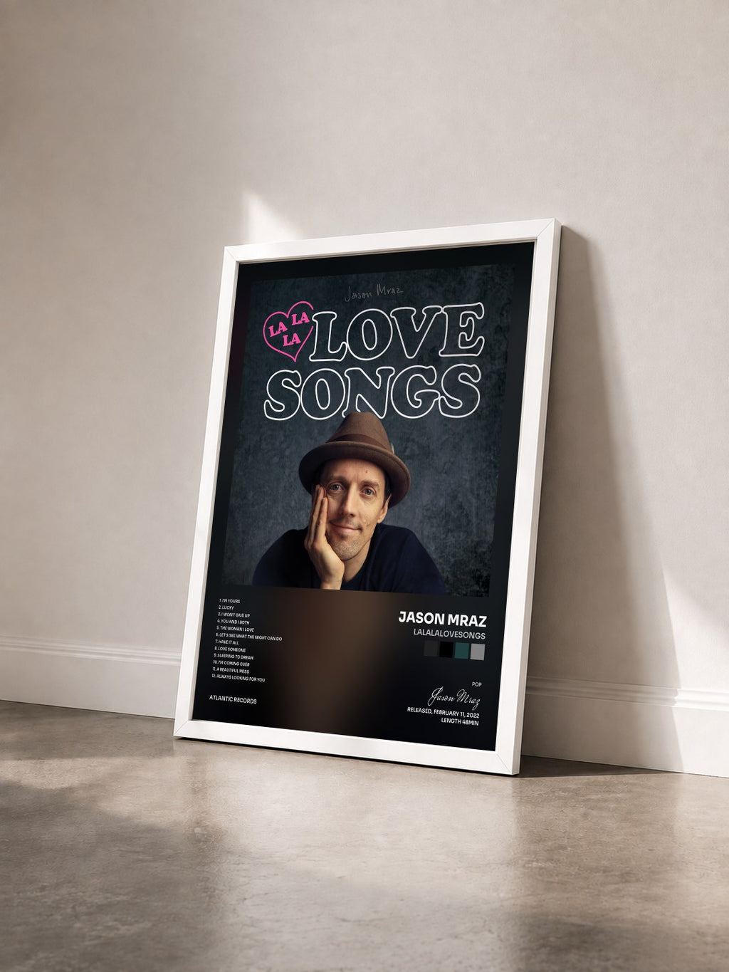 #blanc Lalalalovesongs by Jason Mraz as a framed art print seen at an angle, white frame