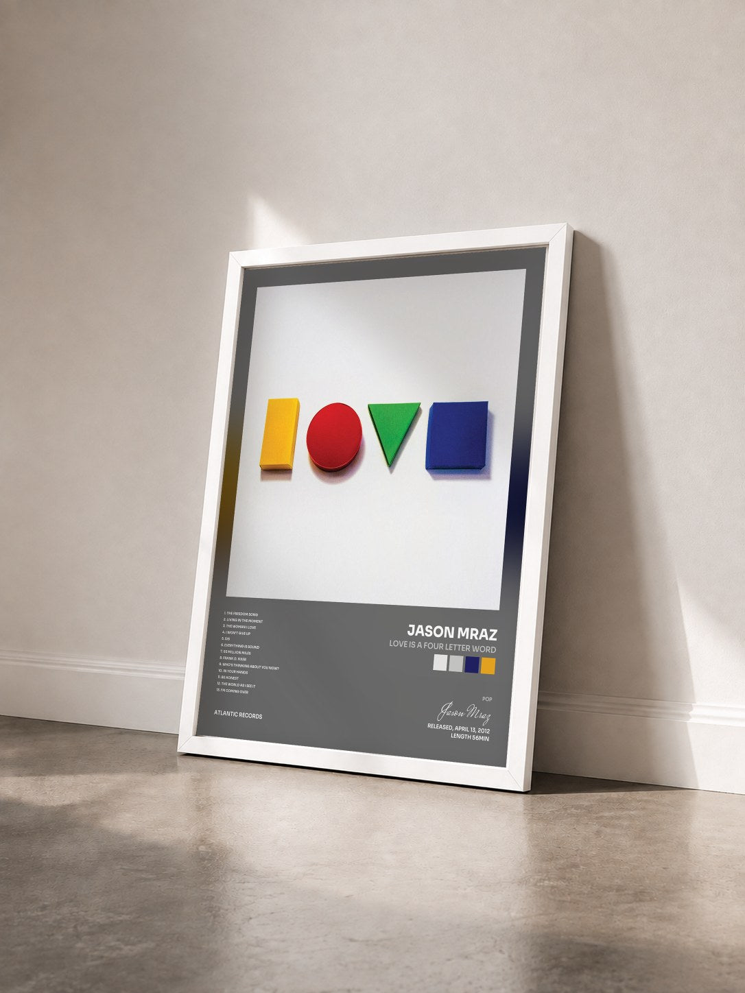 #blanc Tableau de l'album Love Is a Four Letter Word de Jason Mraz vu de trois quarts, cadre blanc