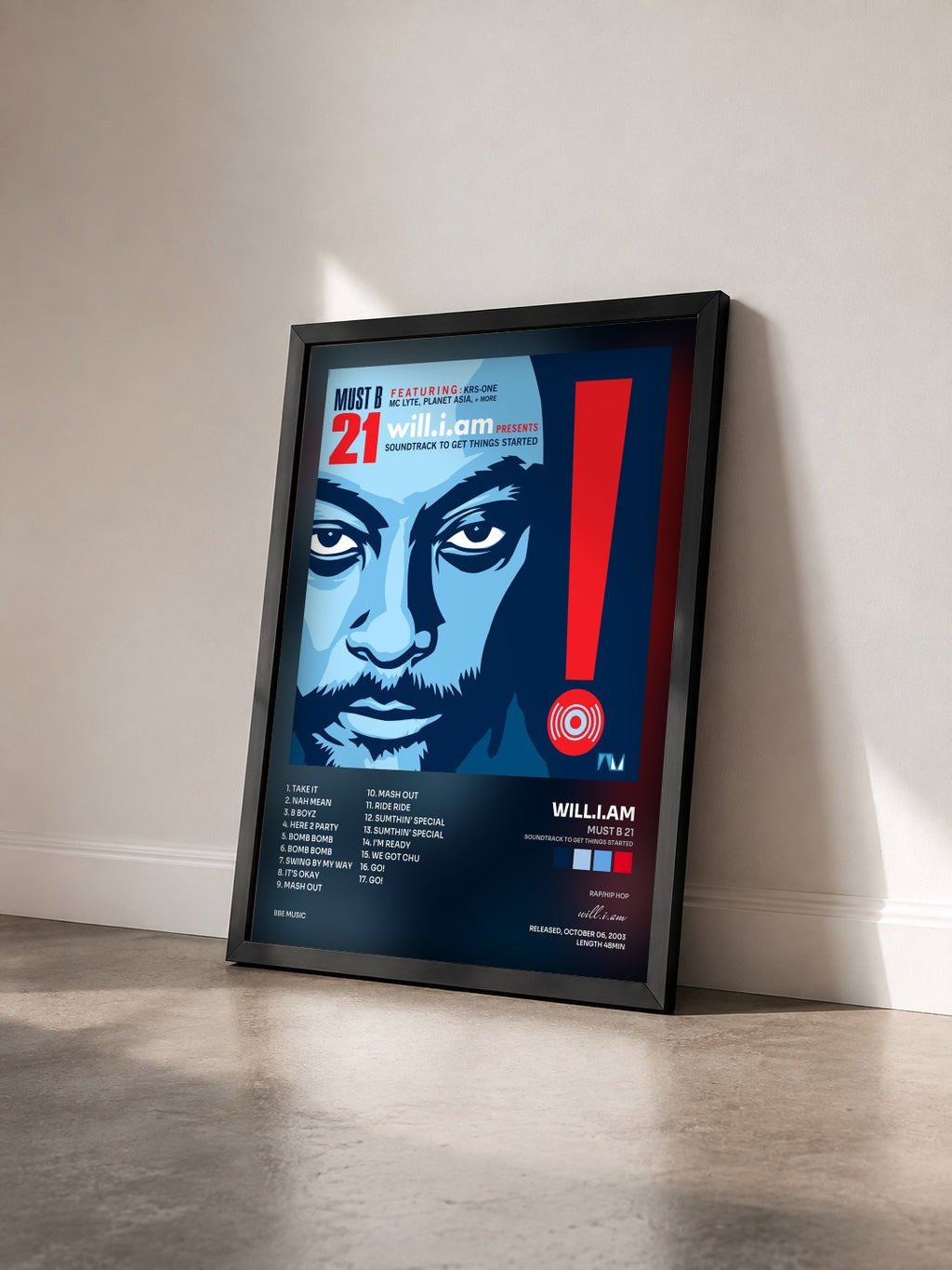 #noir Tableau de l'album Must B 21 (Soundtrack to Get Things Started) de will.i.am vu de trois quarts, cadre noir
