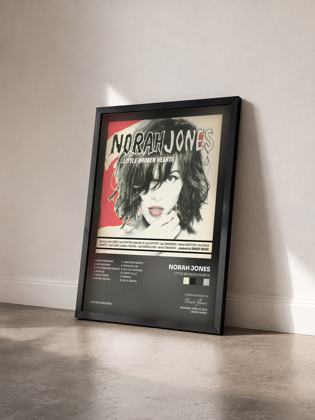 #noir Little Broken Hearts by Norah Jones as a framed art print seen at an angle, black frame