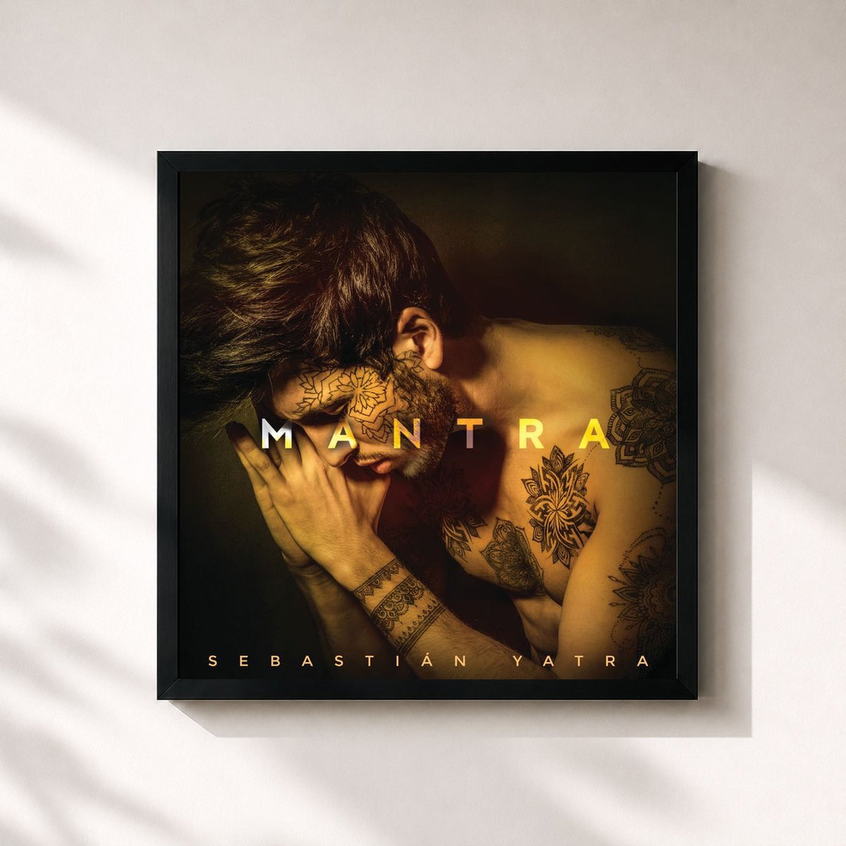 #noir MANTRA by Sebastian Yatra as a square framed art print, black 32x32 cm frame