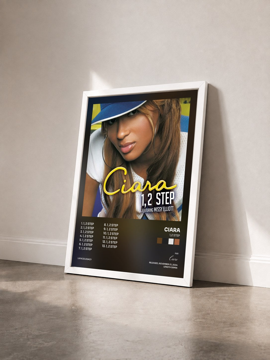 #blanc Tableau de l'album 1,2 Step de Ciara vu de trois quarts, cadre blanc