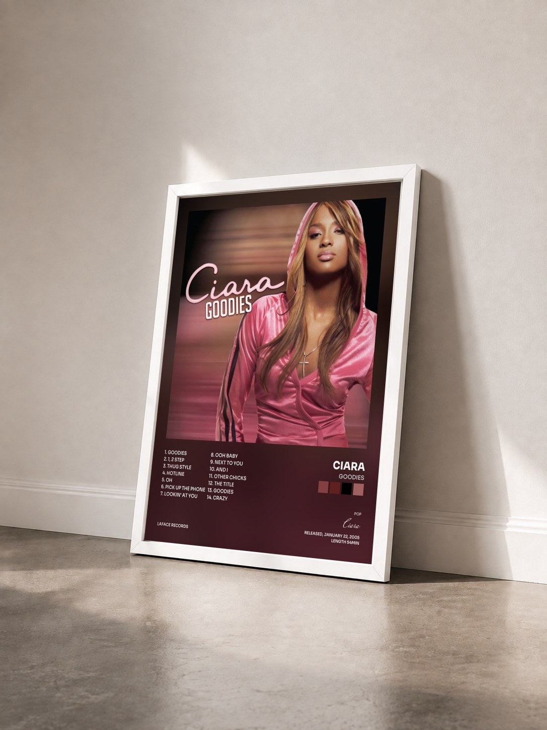 #blanc Tableau de l'album Goodies de Ciara vu de trois quarts, cadre blanc