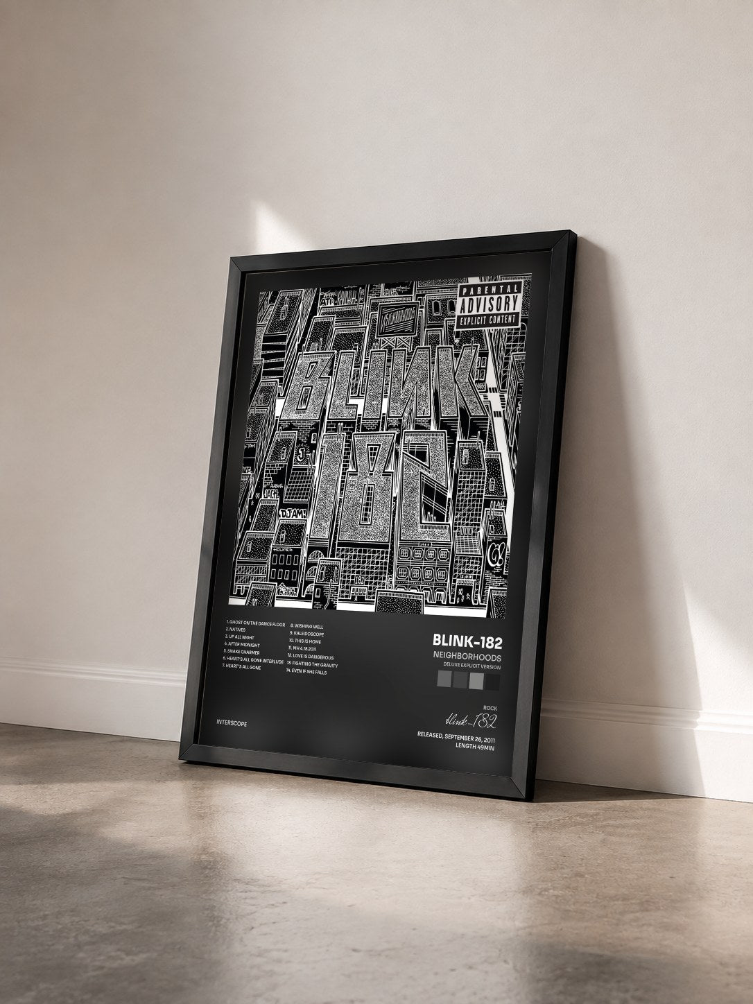#noir Tableau de l'album Neighborhoods (Deluxe Explicit Version) de blink-182 vu de trois quarts, cadre noir